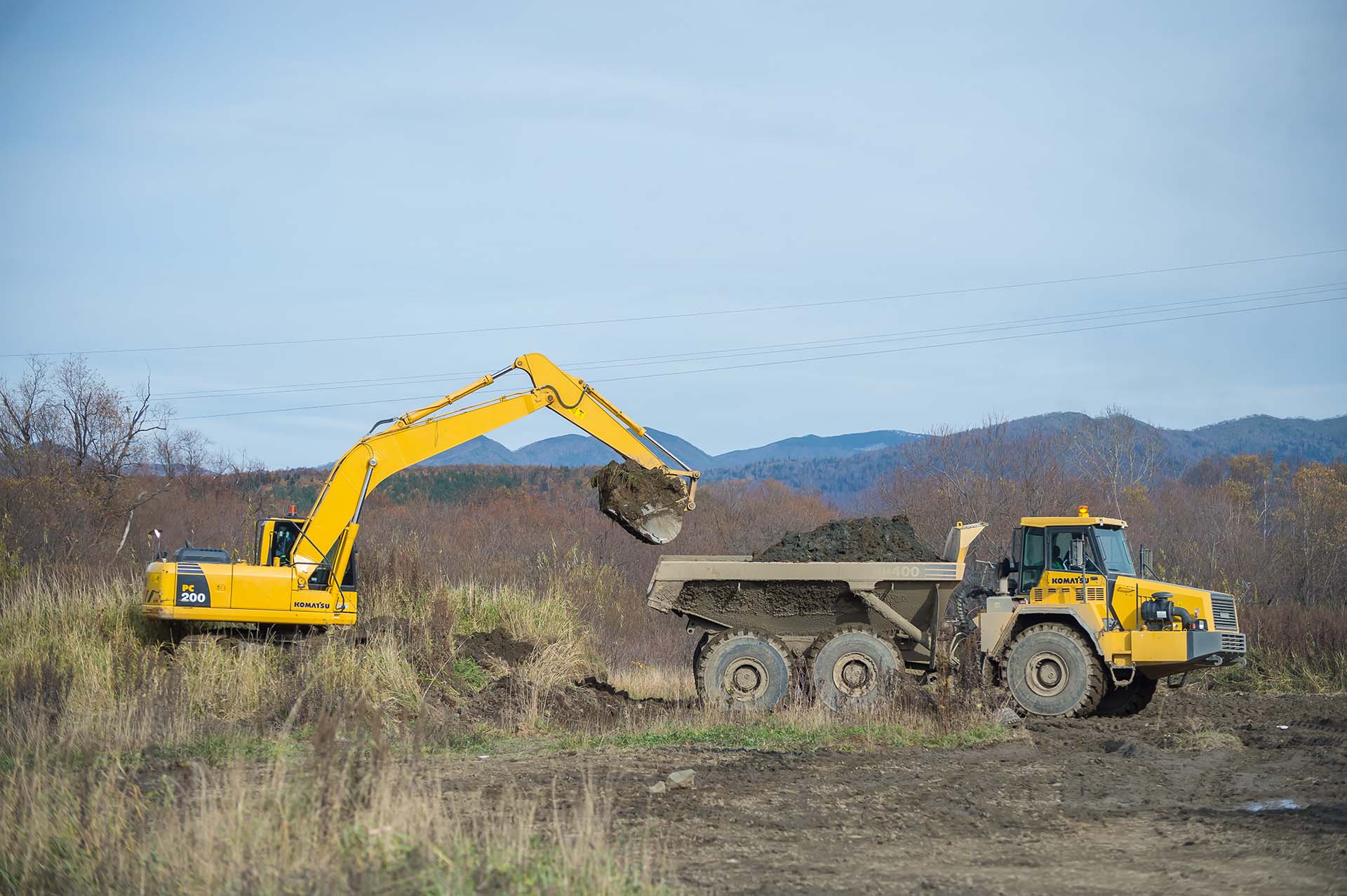 Дром спецтехника. Модерн Машинери Коматсу. Элеватормельстрой Чукотка. Komatsu hd785. Автосамосвал Komatsu hd785.
